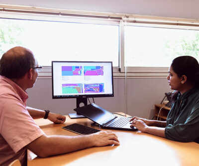 Two almacam's employees working on their nesting software Nest and Cut on the computer